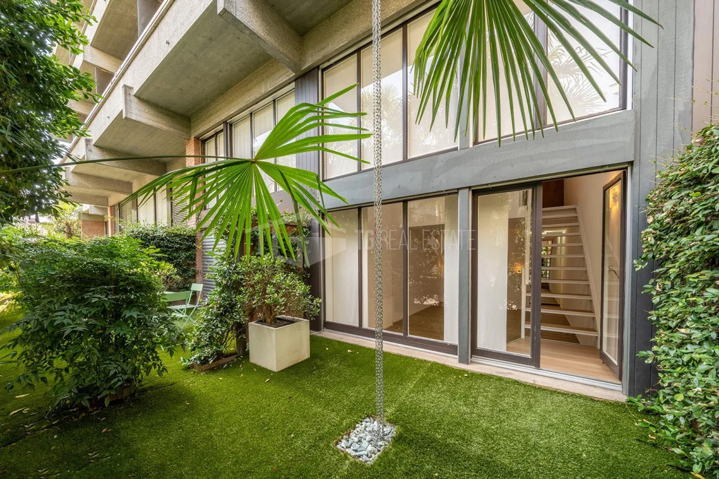 DUPLEX MIT GARTEN IM ZENTRUM VON LUGANO - Foto 1 von 14