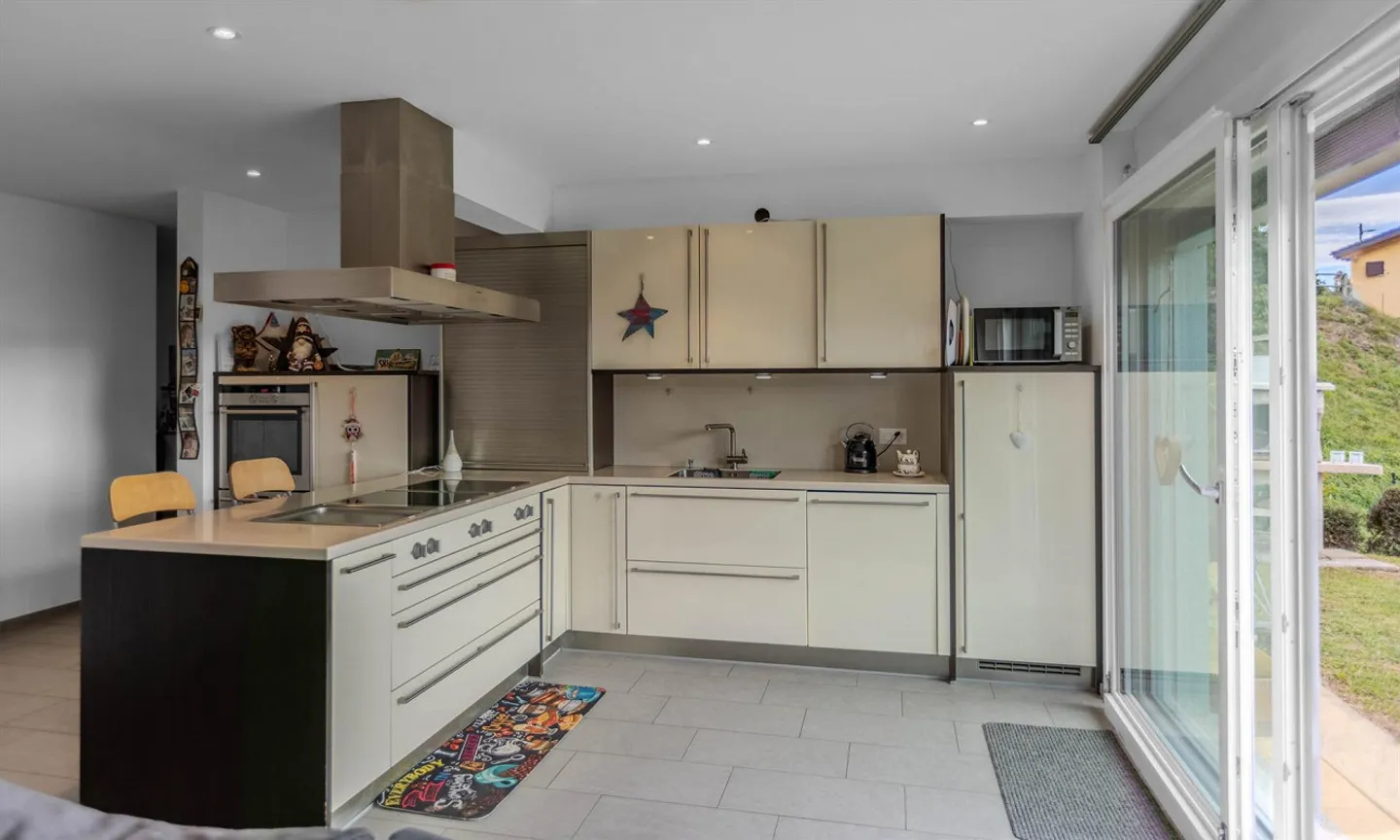 Bellissima casa con 6,5 stanze e giardino a Miglieglia - Foto 4 di 9