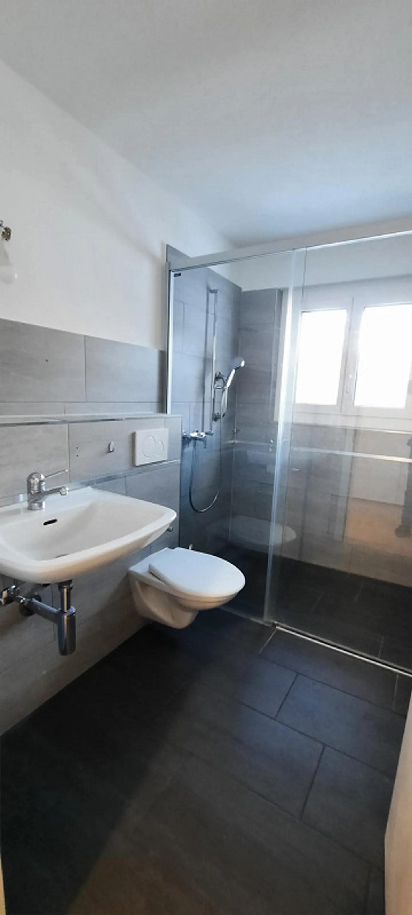 Appartement 4.5 pièces dans une maison bifamiliale avec espace jardin, ZEV - Photo 7 sur 24