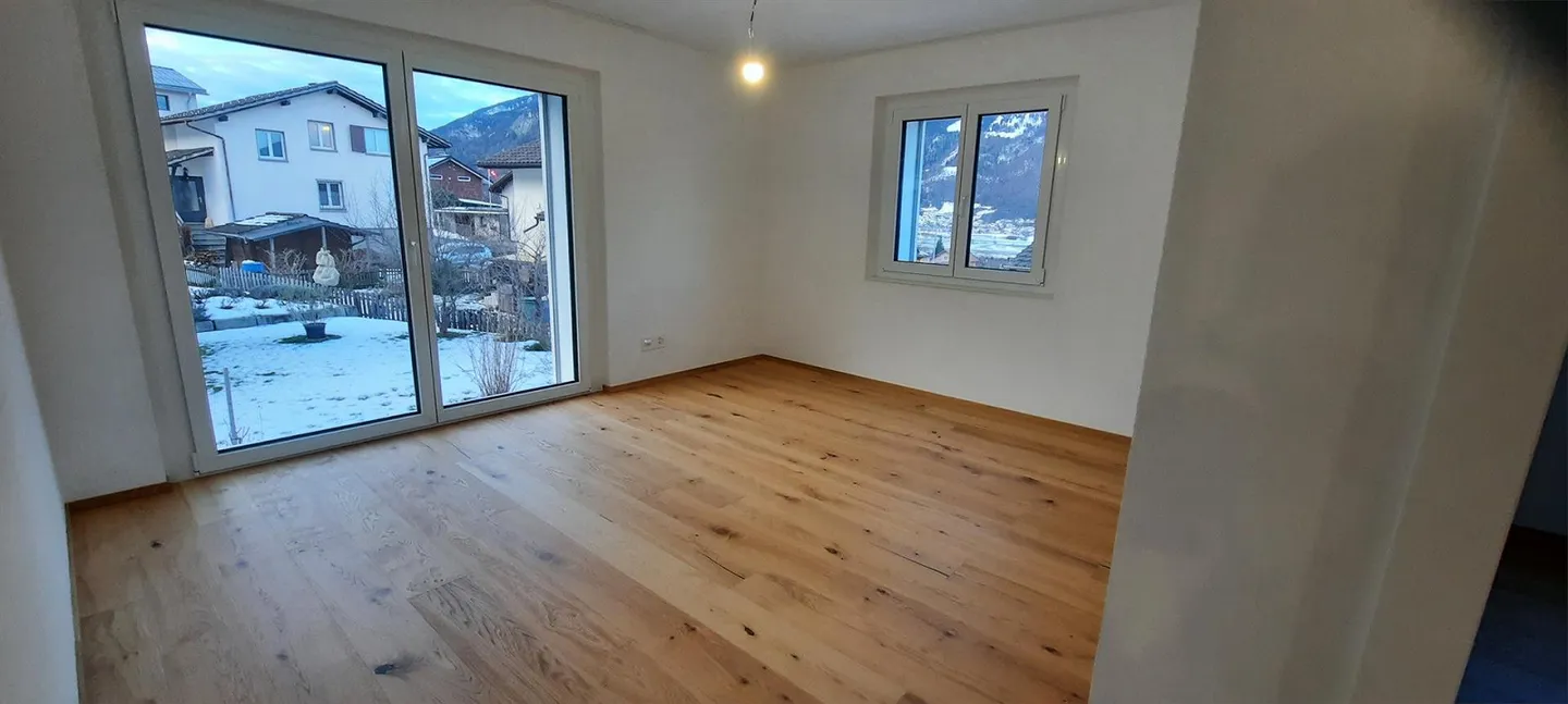 Appartement 4.5 pièces dans une maison bifamiliale avec espace jardin, ZEV - Photo 8 sur 24