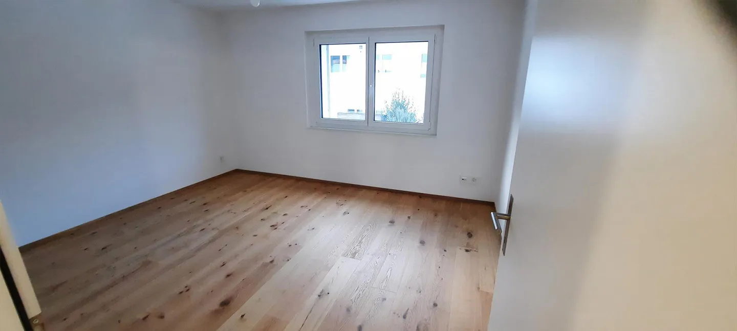 Appartement 4.5 pièces dans une maison bifamiliale avec espace jardin, ZEV - Photo 10 sur 24