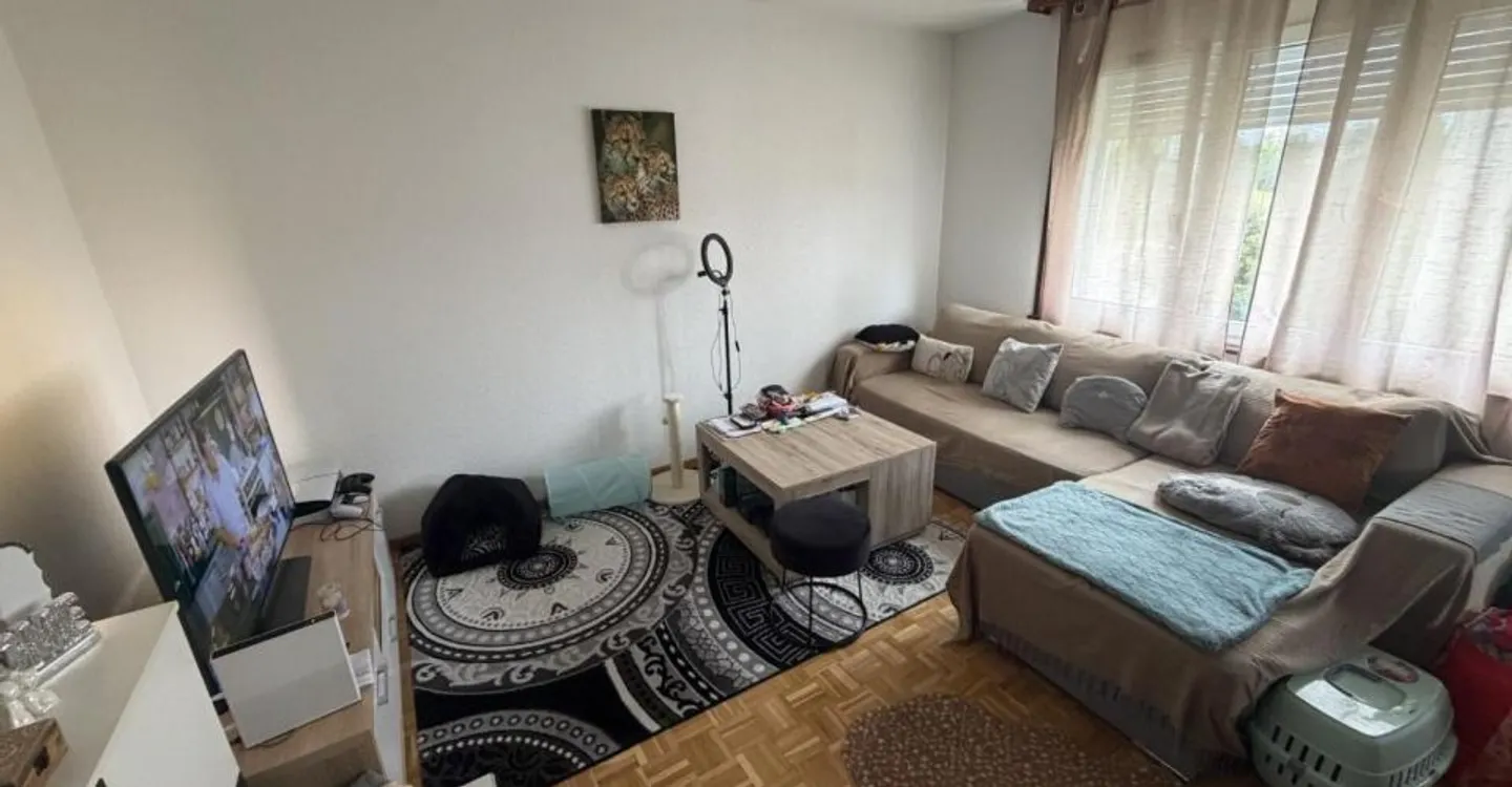Charmant appartement 2.5 pièces - Photo 2 sur 8