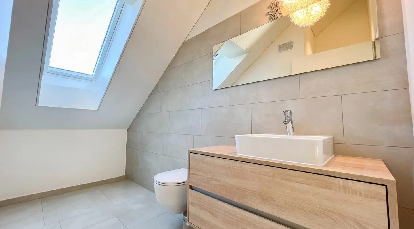 3 1/2 room penthouse apartment with lake view in Mörschwil - Photo 3 of 8