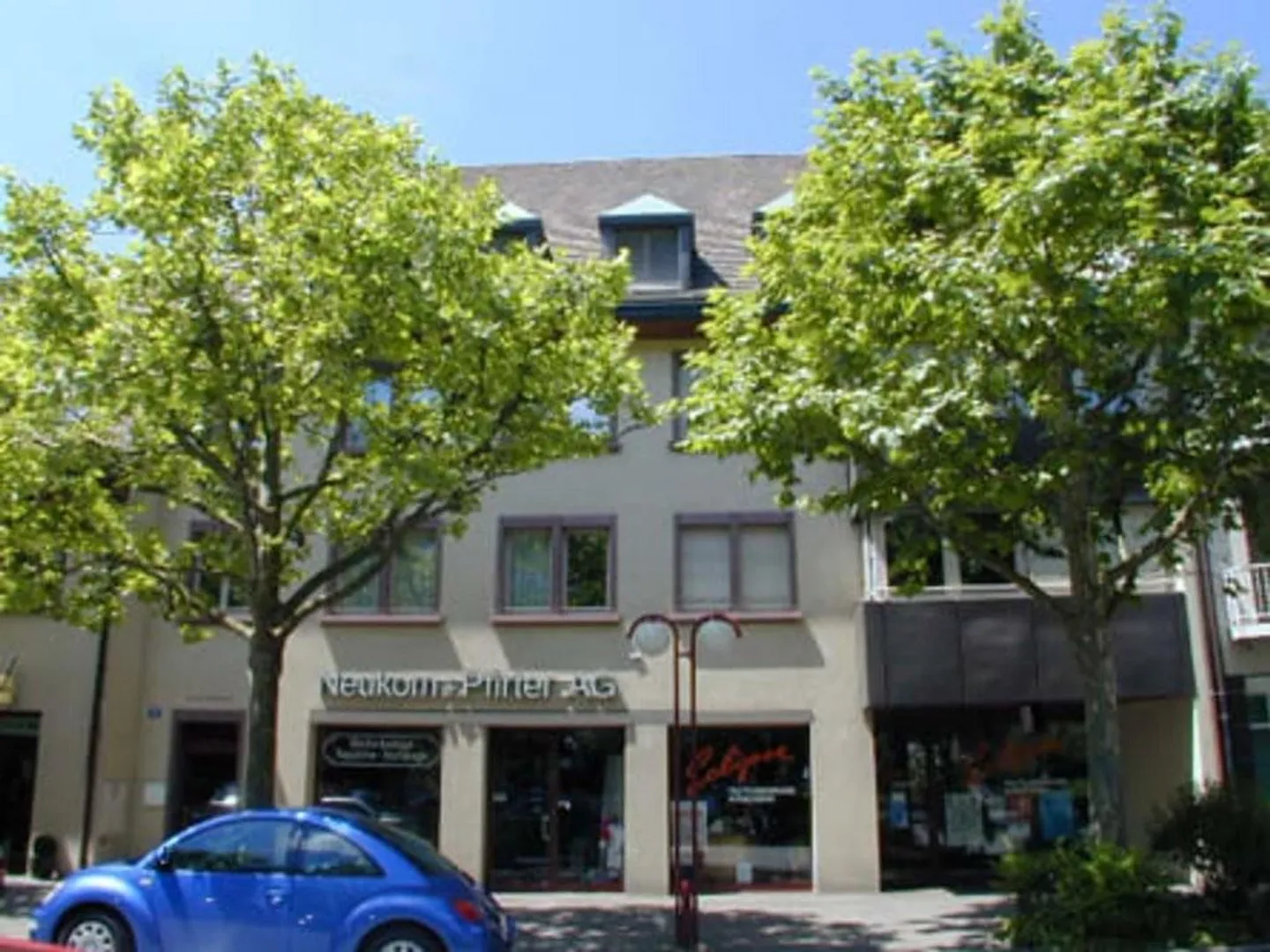 Grosszügige und helle Wohnung in Riehen - Foto 1 von 12