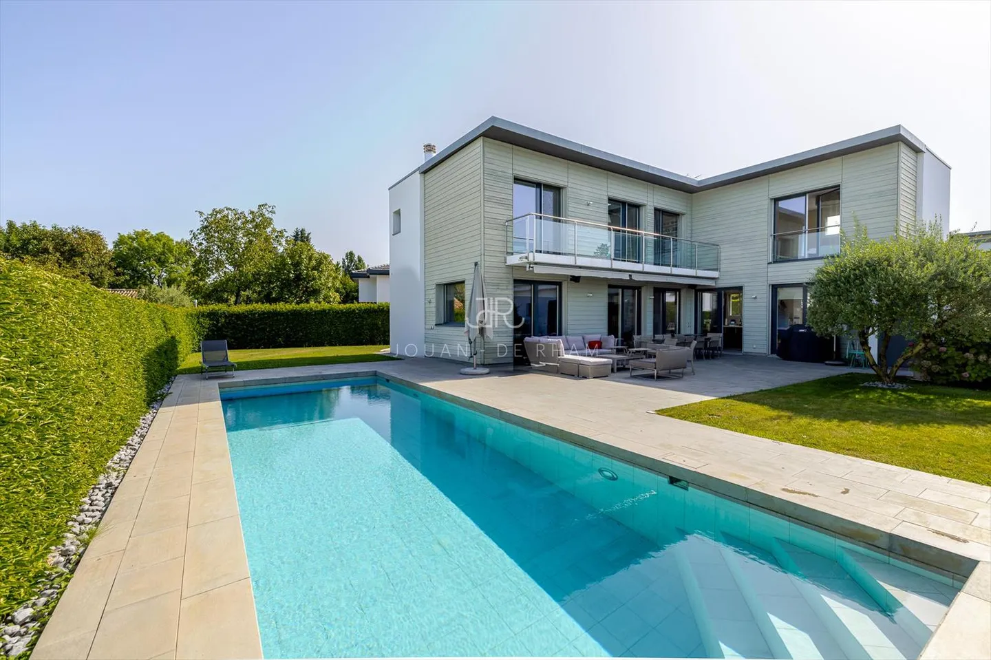 Co-Exclusivité - Magnifique maison contemporaine idéalement située - Photo 1 sur 11