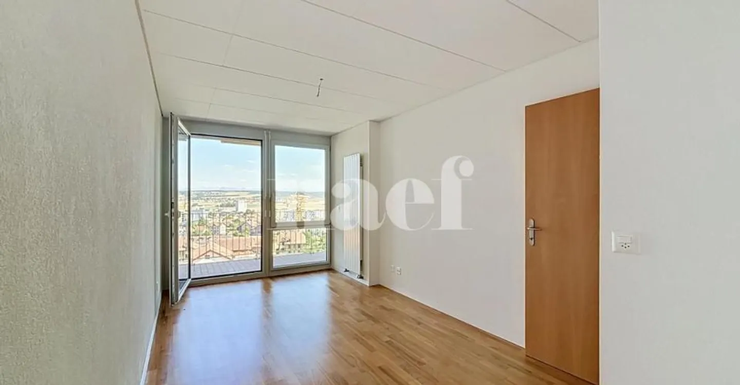 Geräumige Wohnung mit Terrasse - Foto 10 von 11