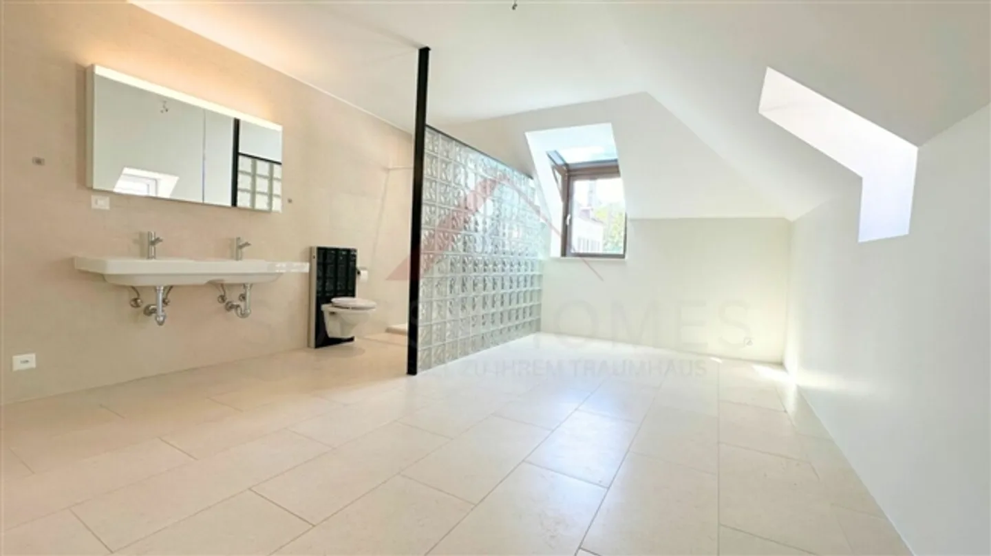 Maisonette rénovée de 200 m² au dernier étage d'un hôtel particulier - Confort et charme à La Chaux-de-Fonds - Photo 9 sur 14