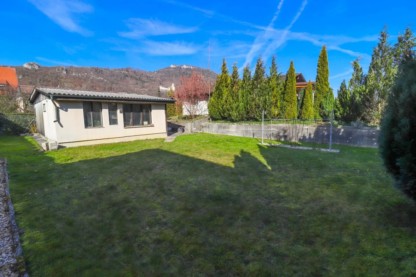 Maison individuelle de 5,5 pièces avec véranda et bâtiment supplémentaire sur un terrain de 1'091 m2 - Photo 12 sur 14