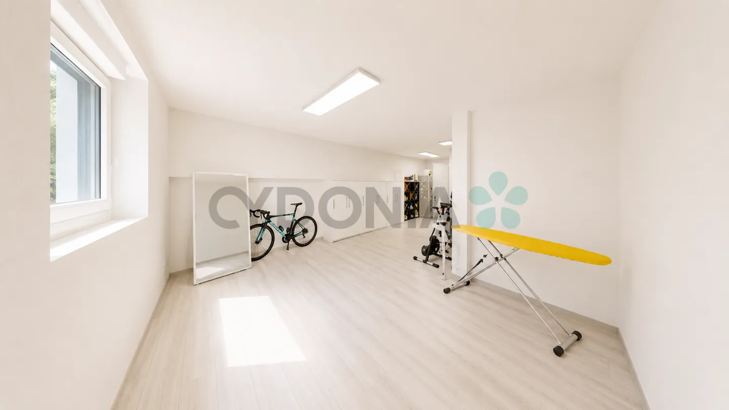 Beautiful terraced house with a surface area of 135 m² spread over three floors, in a zon - Photo 11 of 12