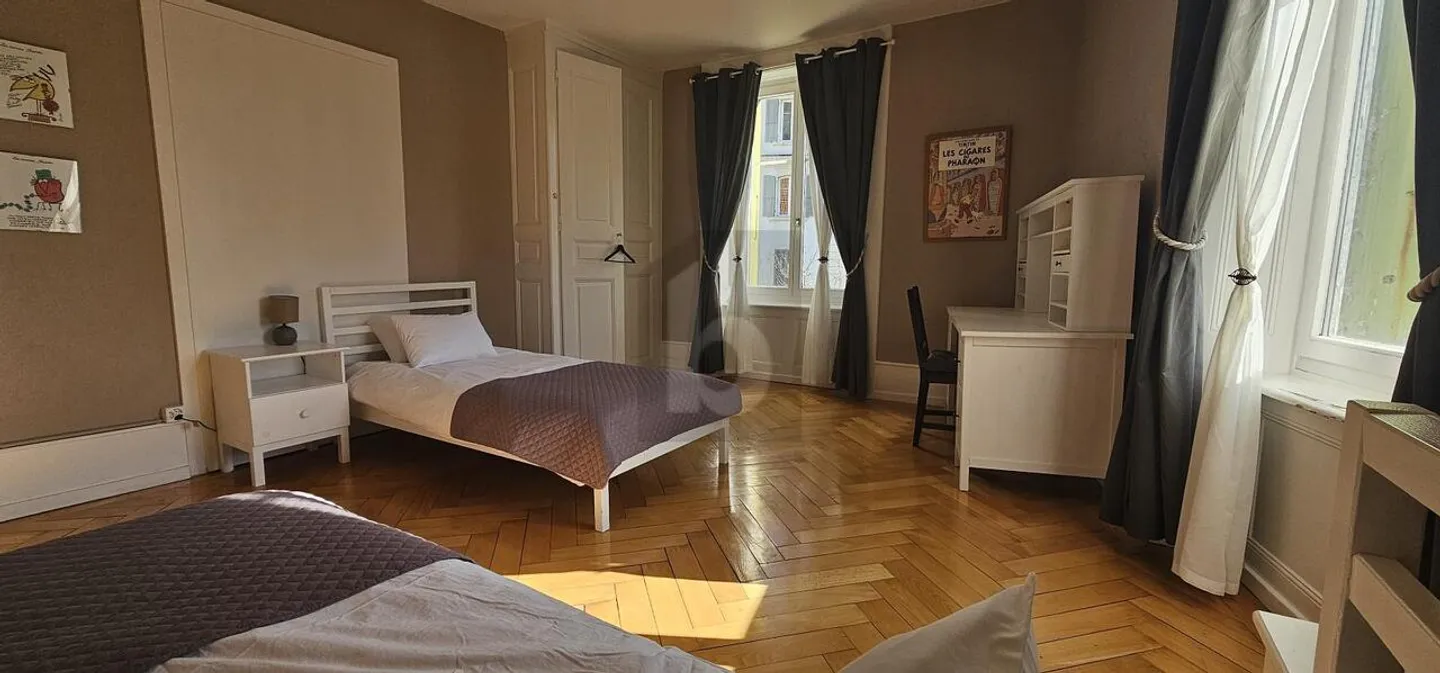 Appartement Lumineux et Chaleureux - Photo 3 sur 5