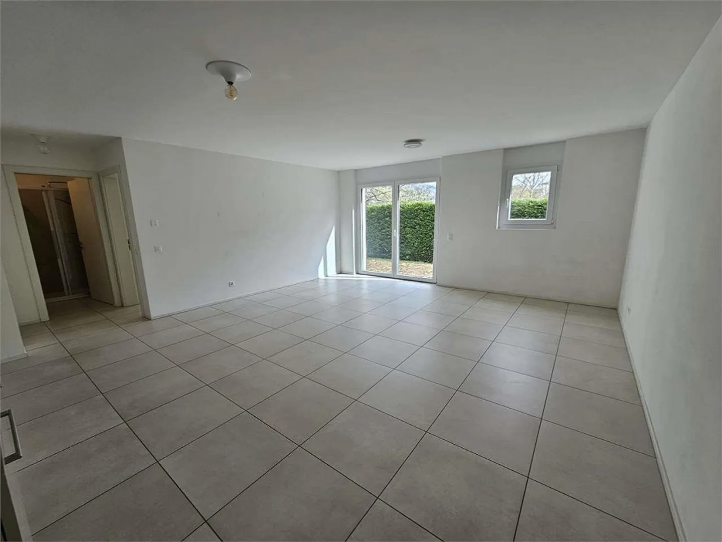 Erdgeschosswohnung mit Garten - Foto 3 von 11