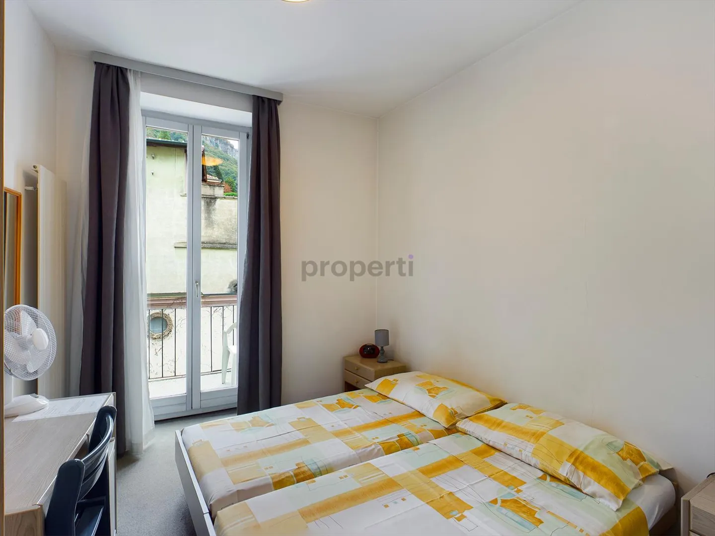 "For Sale: Real Estate Gem in Mendrisio - Central Location and Potential to Exploit" - Photo 5 of 9