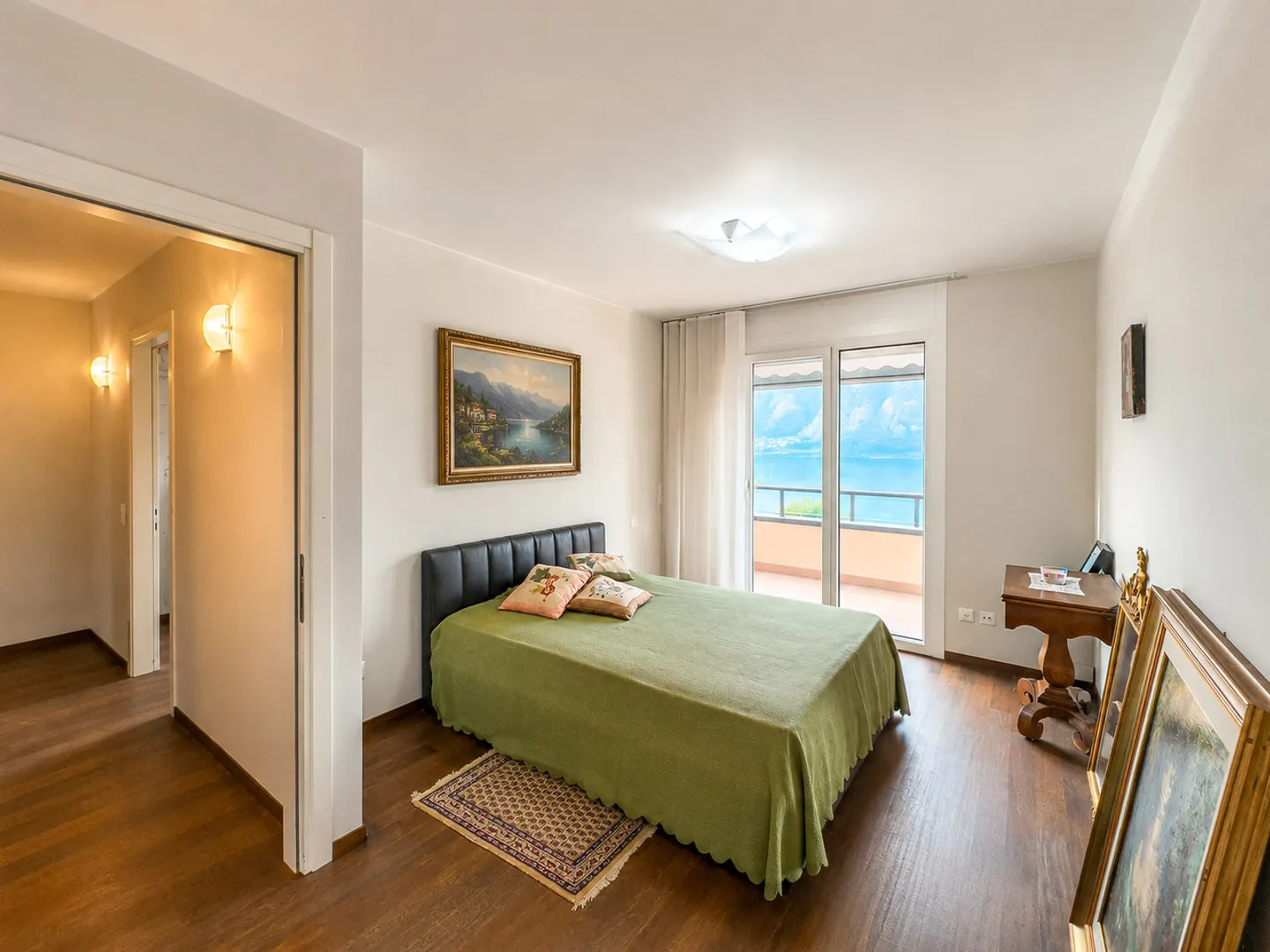 Appartamento con vista lago e giardino a Bissone - Foto 5 di 13