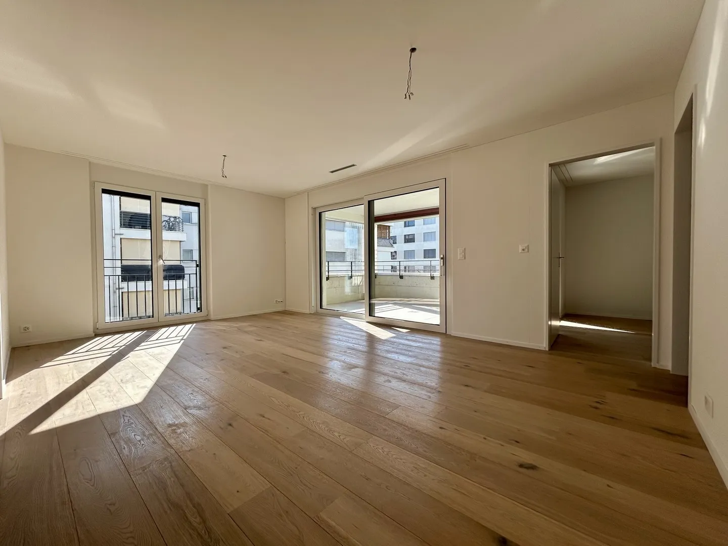 Cercasi primo inquilino: Appartamento moderno di 3,5 stanze in un nuovo edificio Minergie - Foto 1 di 12