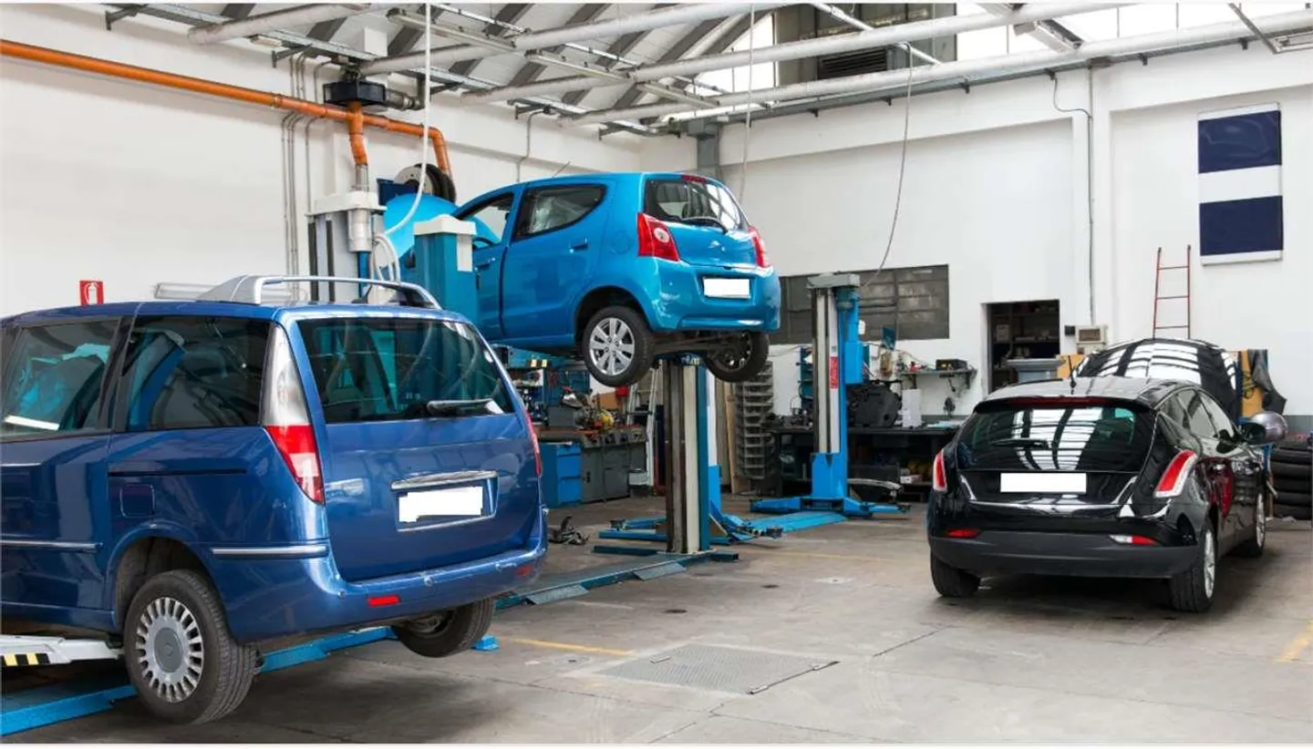 AUTOWERKSTATT UND EINKOMMENSBÜROS - Foto 1 von 1
