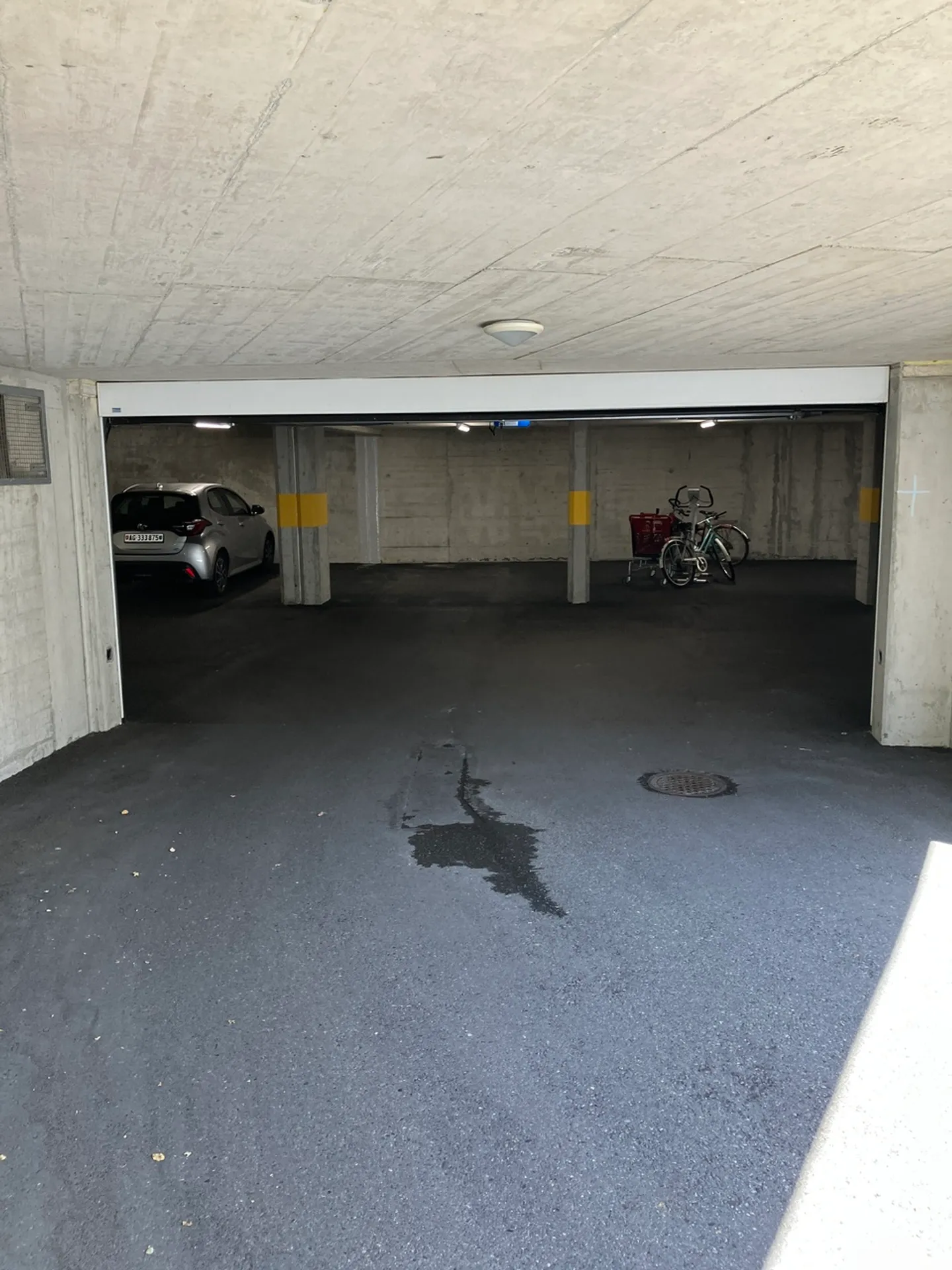 Geräumiger Tiefgaragenparkplatz in Reinach - Foto 2 von 7
