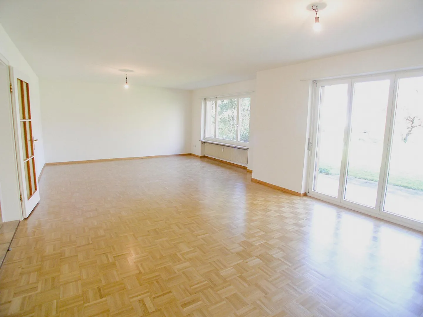 Geräumige Wohnung mit Garten - Foto 4 von 13