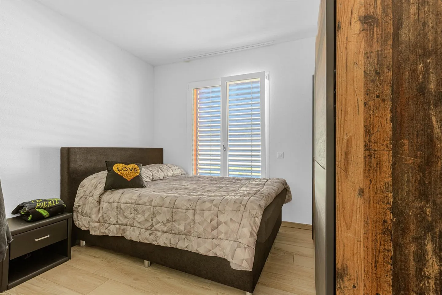 Appartement spacieux et moderne de 3,5 pièces avec jardin à Curio - Photo 7 sur 9