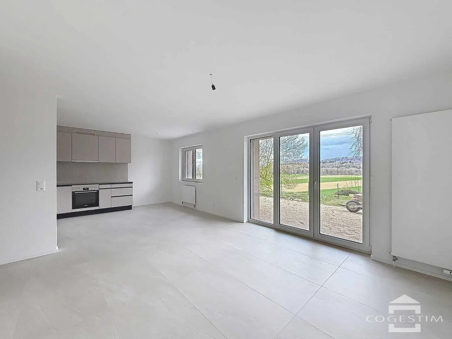 Appartement rénové avec jardin - Photo 1 sur 7