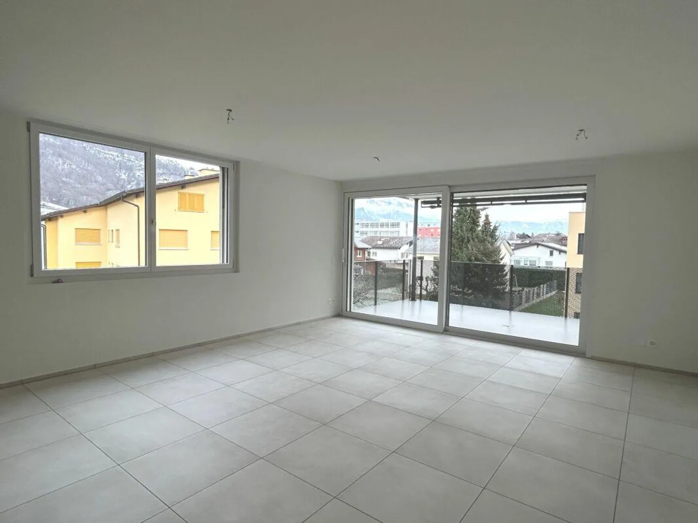 Vivre dans le vert - Appartement 2.5 pièces au 2ème étage - Photo 4 sur 12