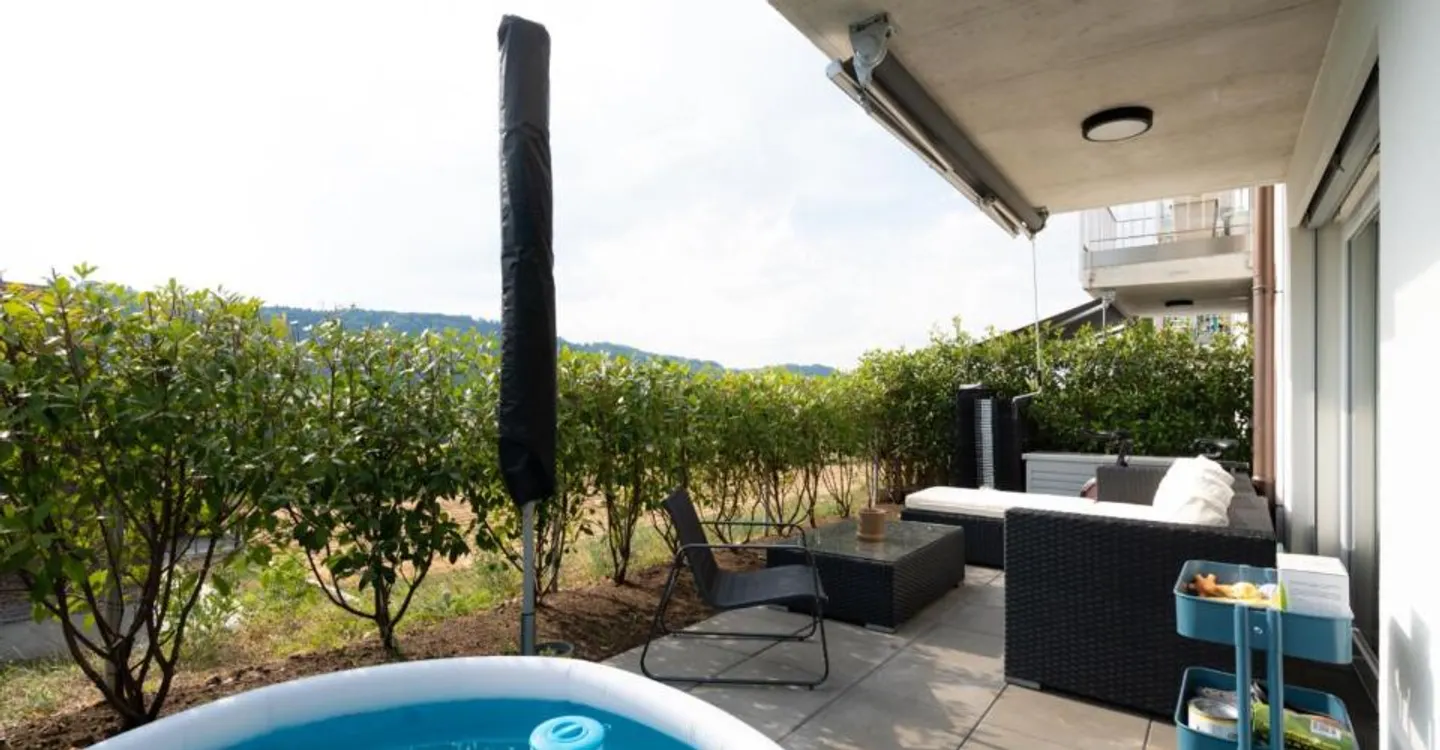 Appartement moderne avec terrasse - Photo 3 sur 5