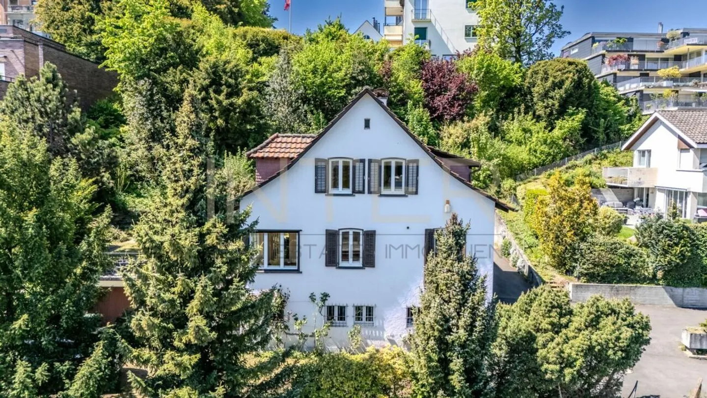 Stilvolles freistehendes Haus mit Seesicht - Foto 8 von 30