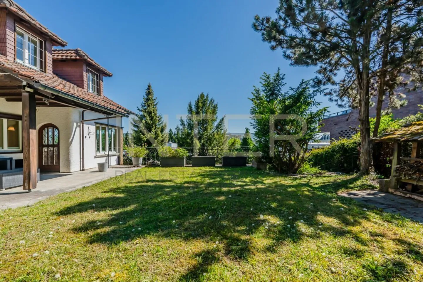 Stilvolles freistehendes Haus mit Seesicht - Foto 28 von 30