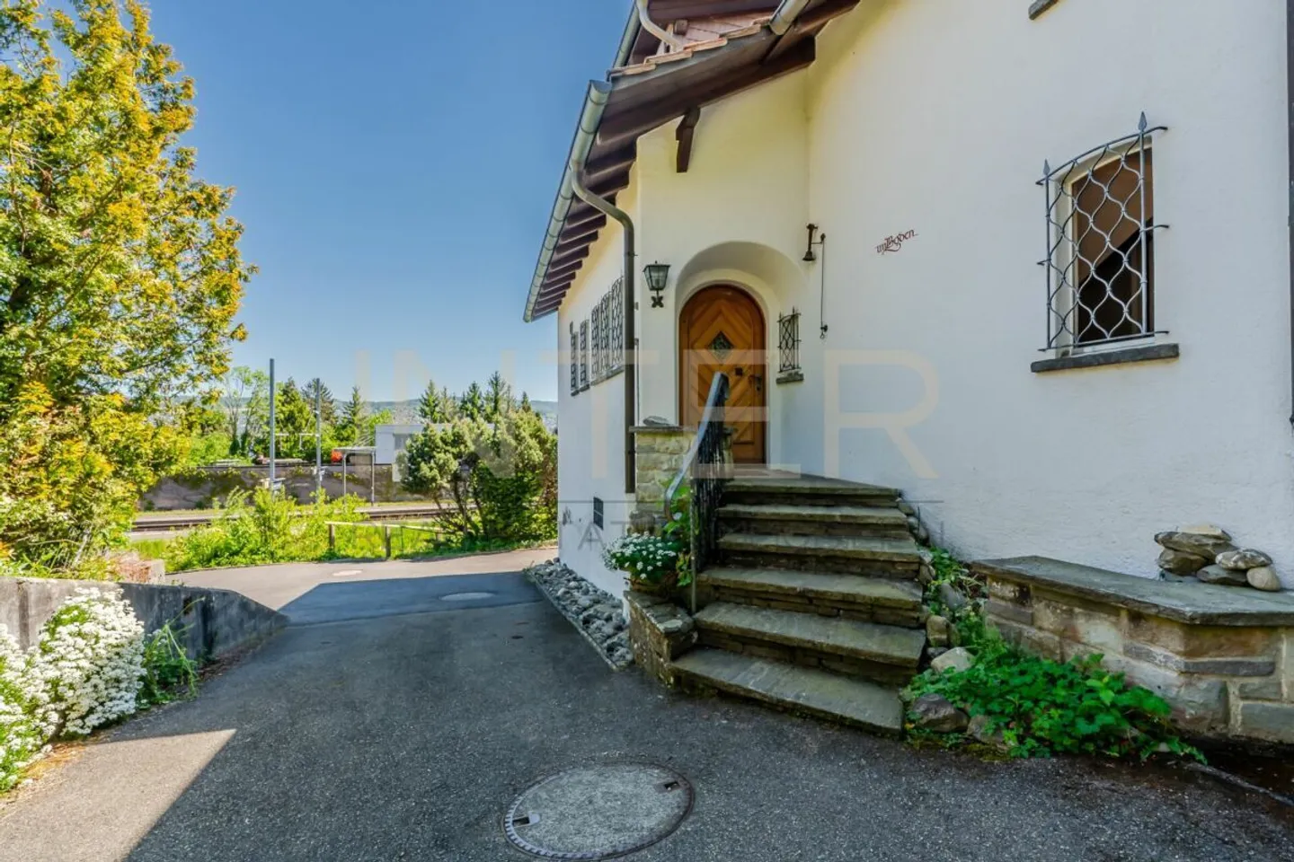 Stilvolles freistehendes Haus mit Seesicht - Foto 29 von 30