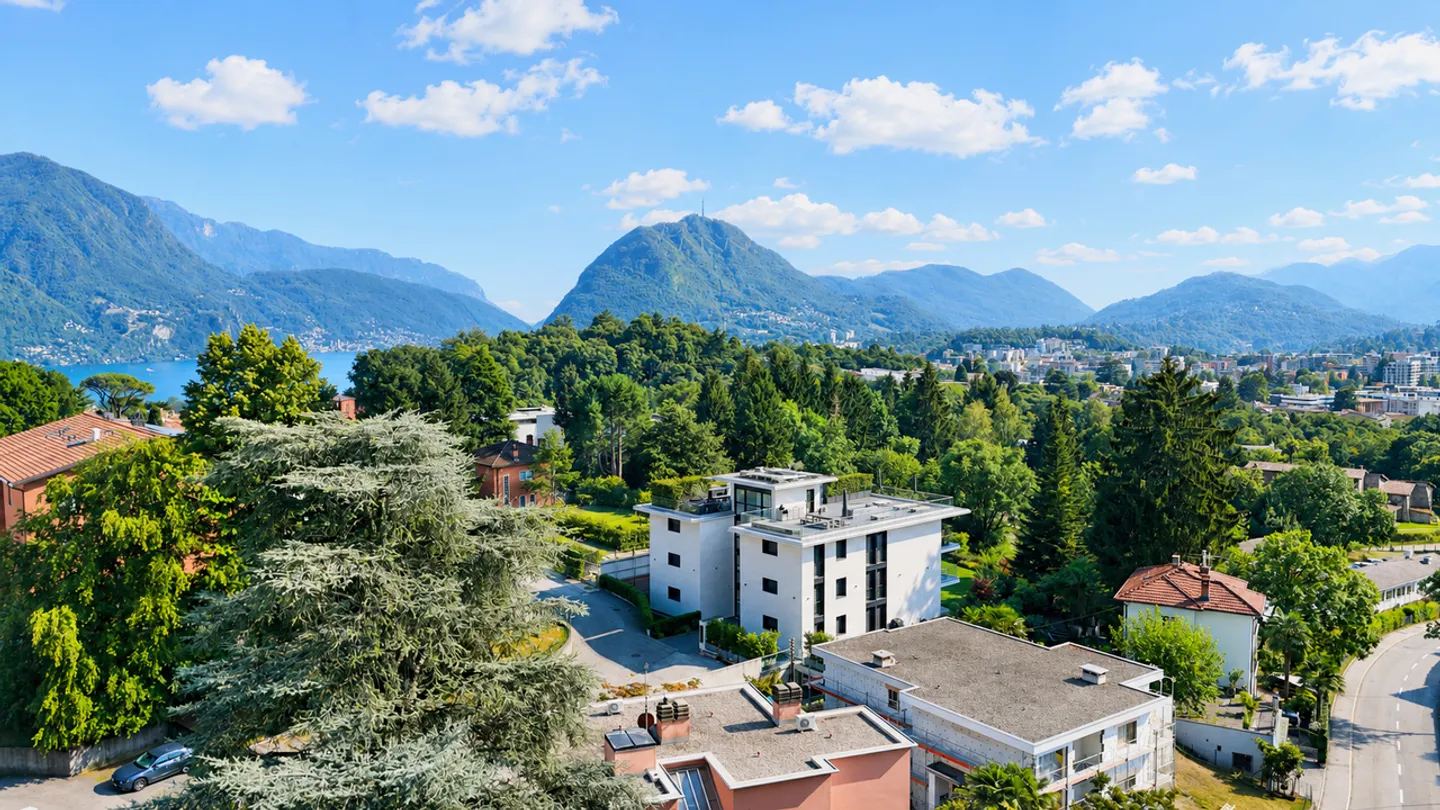 Appartement Meublé Élégant avec Vue Panoramique à Porza - Photo 2 sur 16