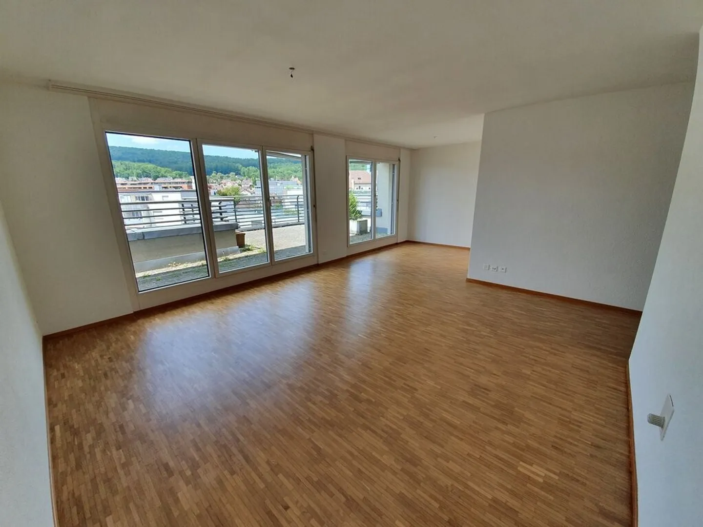 A Happy Start to Apartment Living Above the Rooftops - Photo 2 of 12