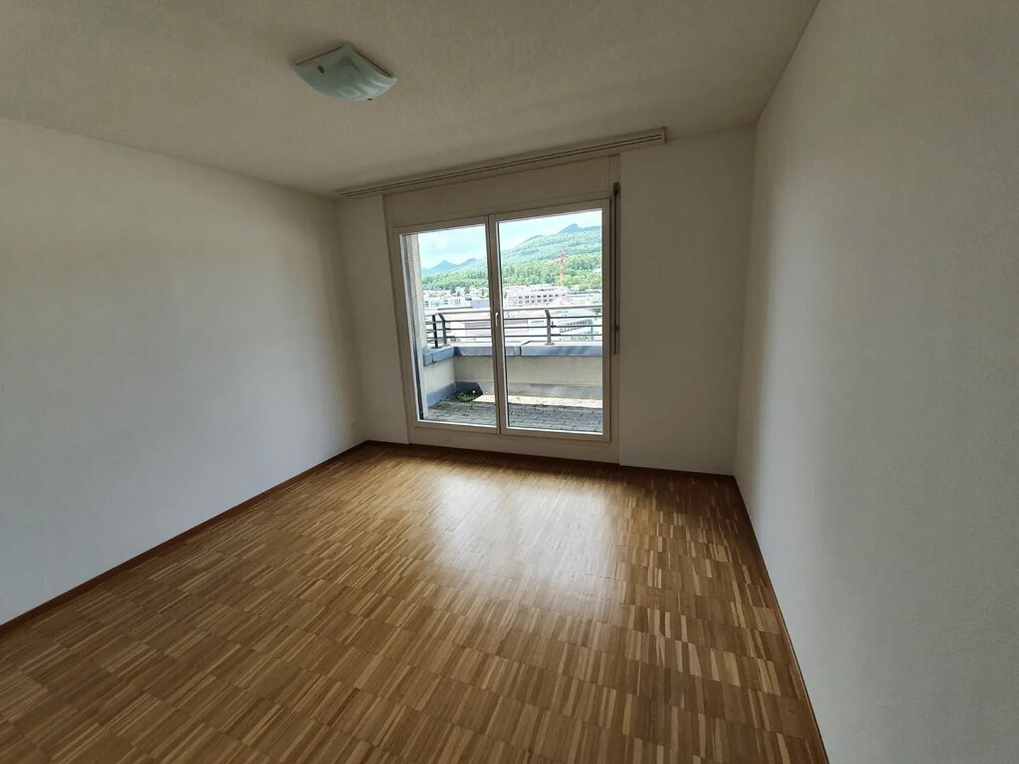 A Happy Start to Apartment Living Above the Rooftops - Photo 3 of 12