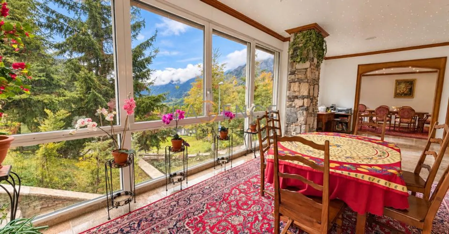 THE ELEGANCE OF A LARGE PRIVATE CHALET FACING THE ALPS - Photo 2 of 13
