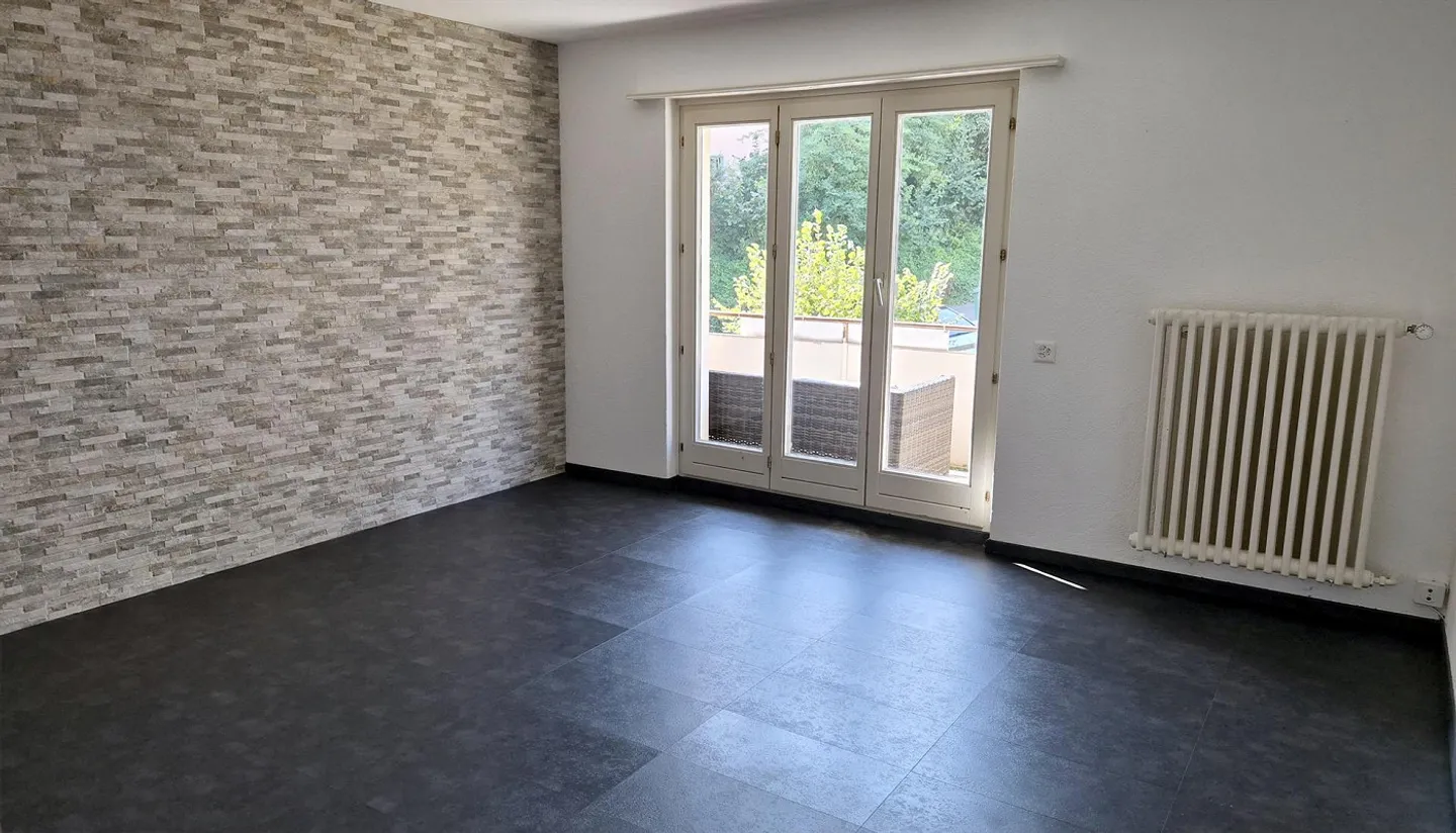 Charming 3.5-room apartment including parking space in a quiet, green location - Photo 6 of 9