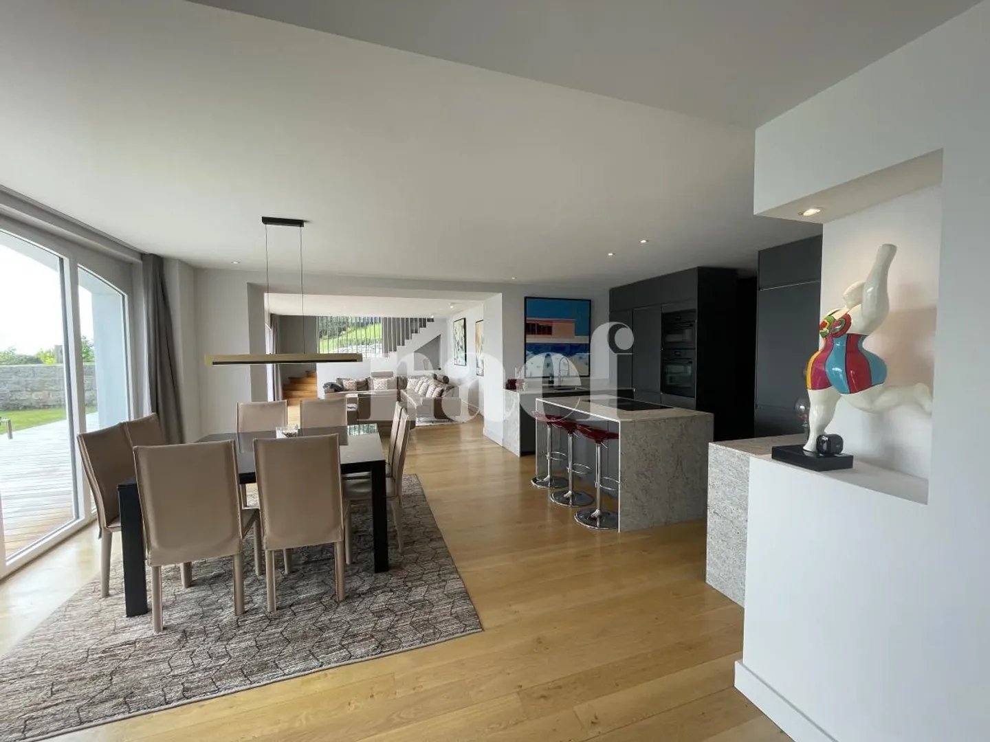 Extraordinary 8-Room Property with Panoramic Lake View and Heated Pool - Photo 4 of 13