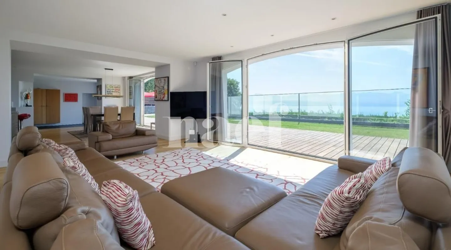Extraordinary 8-Room Property with Panoramic Lake View and Heated Pool - Photo 6 of 13