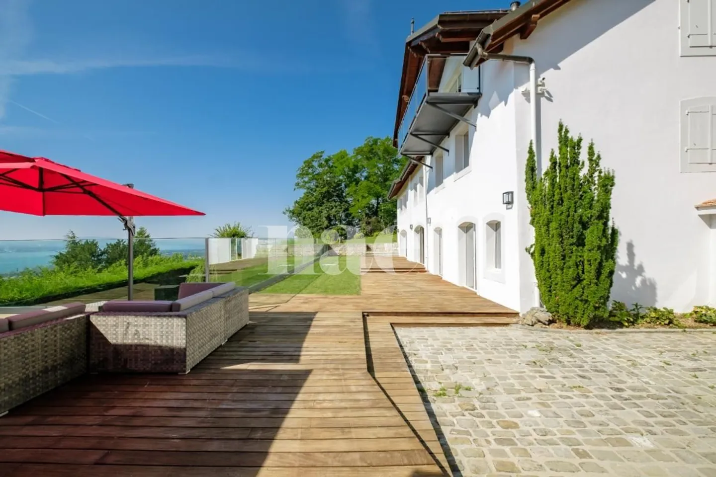 Extraordinary 8-Room Property with Panoramic Lake View and Heated Pool - Photo 1 of 13