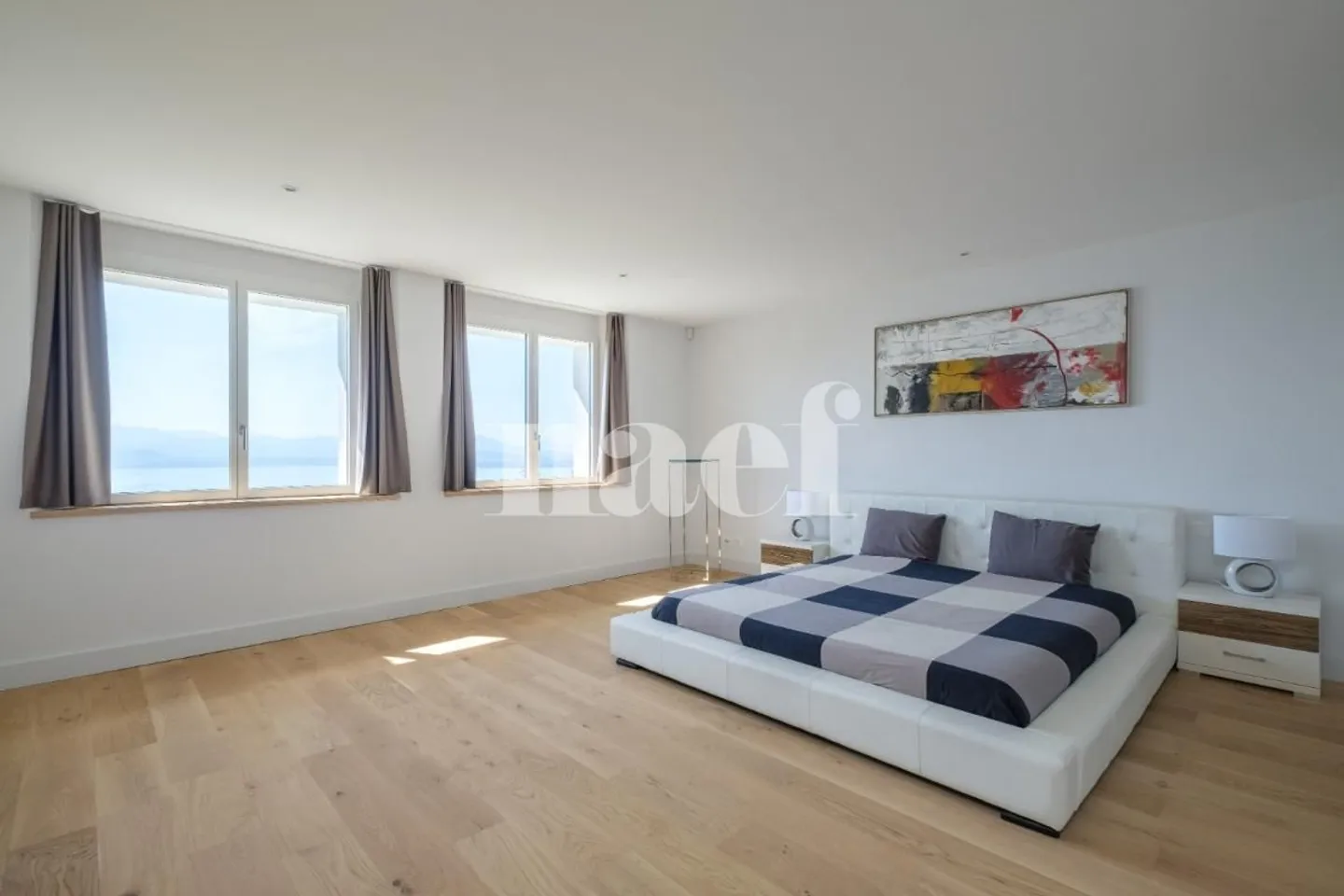 Extraordinary 8-Room Property with Panoramic Lake View and Heated Pool - Photo 9 of 13