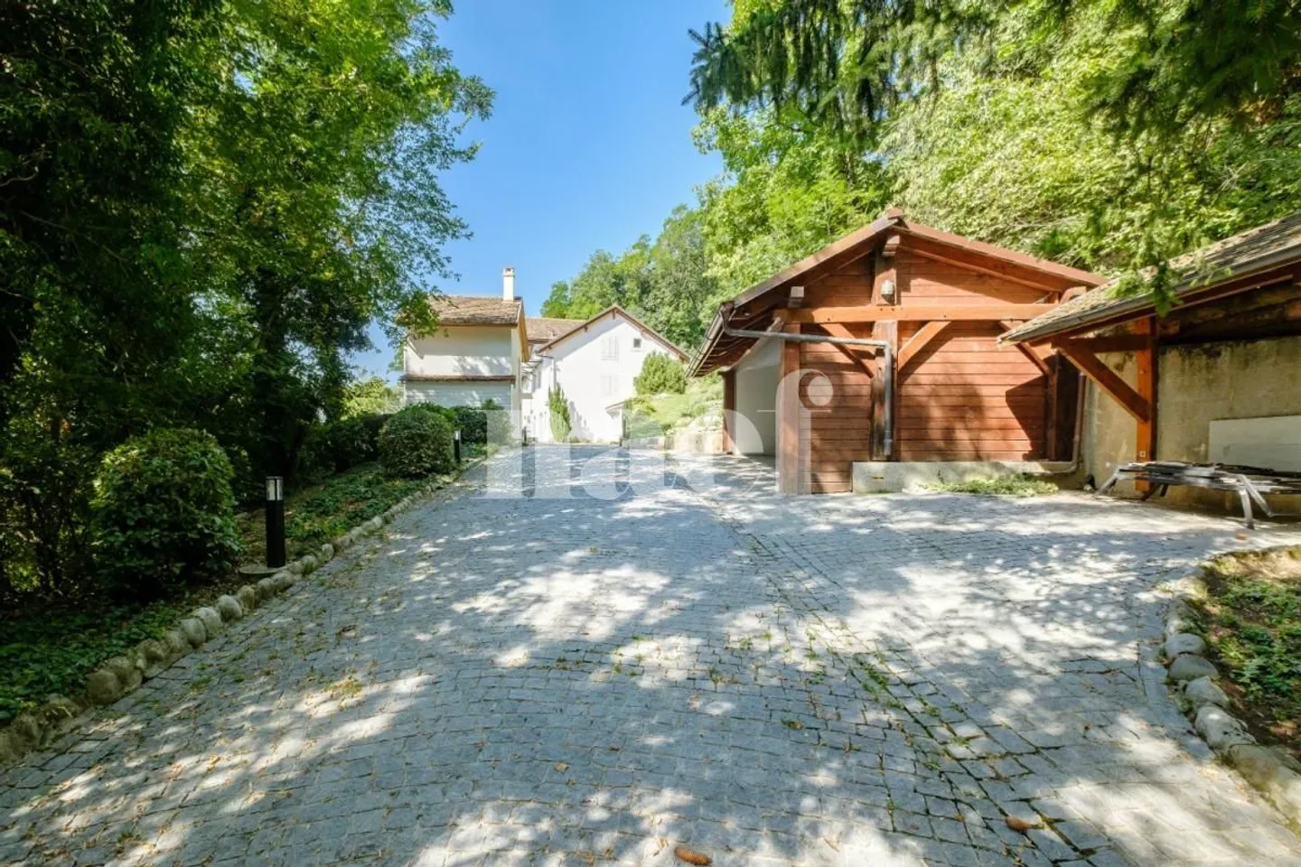 Extraordinary 8-Room Property with Panoramic Lake View and Heated Pool - Photo 13 of 13