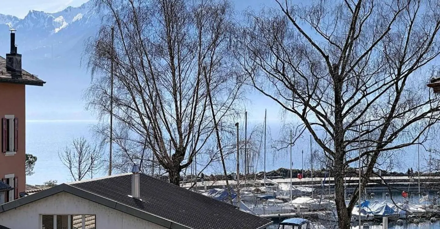 Charmante Wohnung mit Seeblick - Foto 1 von 9