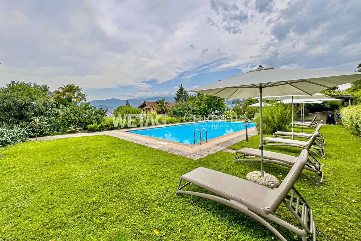 Lugano-Ruvigliana: elegant apartment with breathtaking lake view, pool & garden for sale - Photo 6 of 9