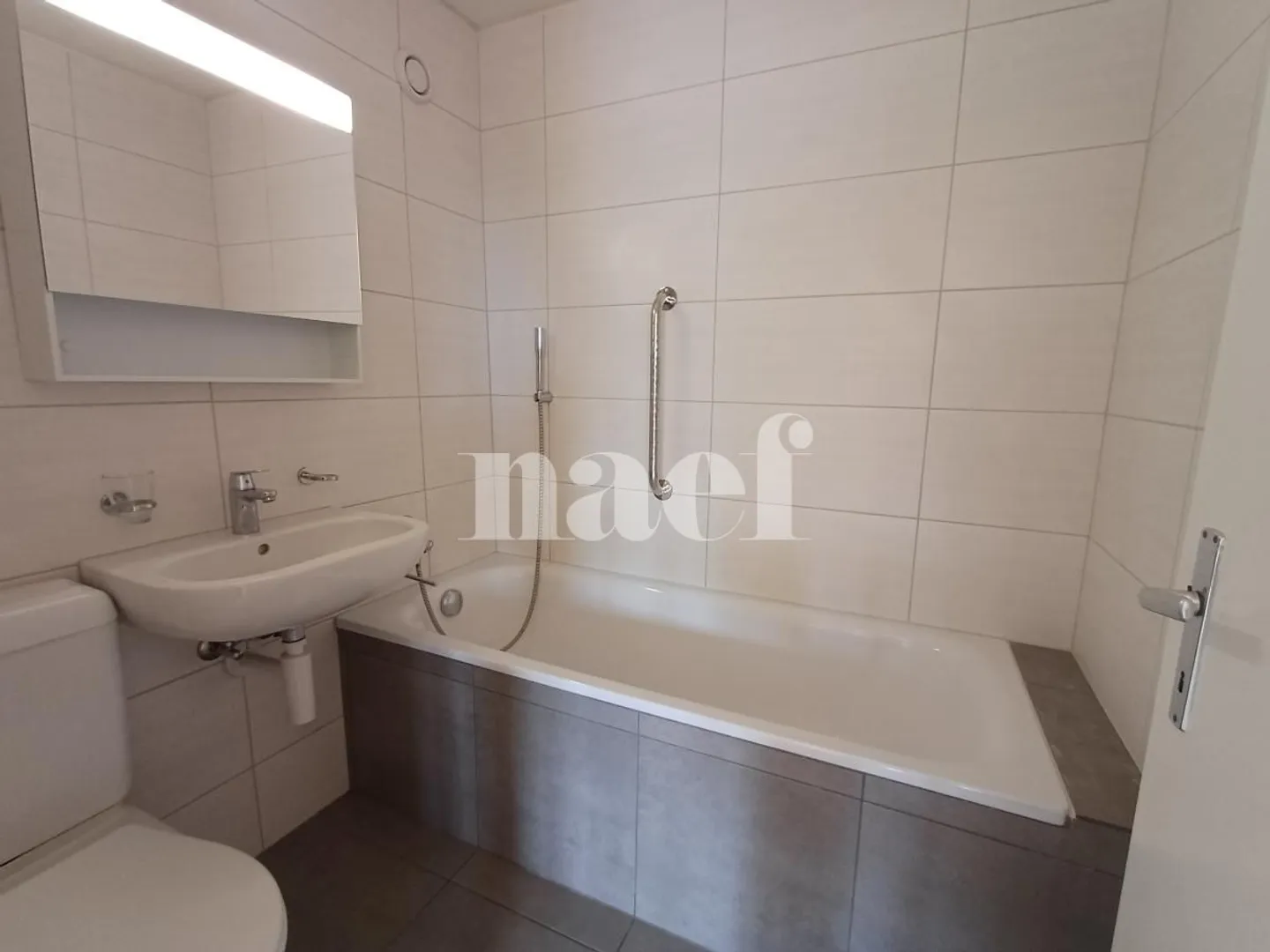 Appartement dans les hauteurs de la Ville - Photo 4 sur 9