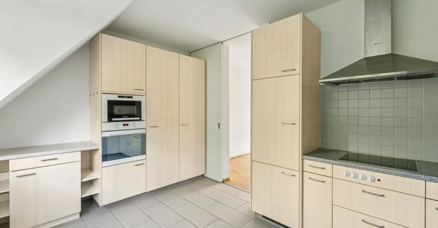 Geräumige Wohnung mit einzigartigem Dachspitz - Foto 1 von 9