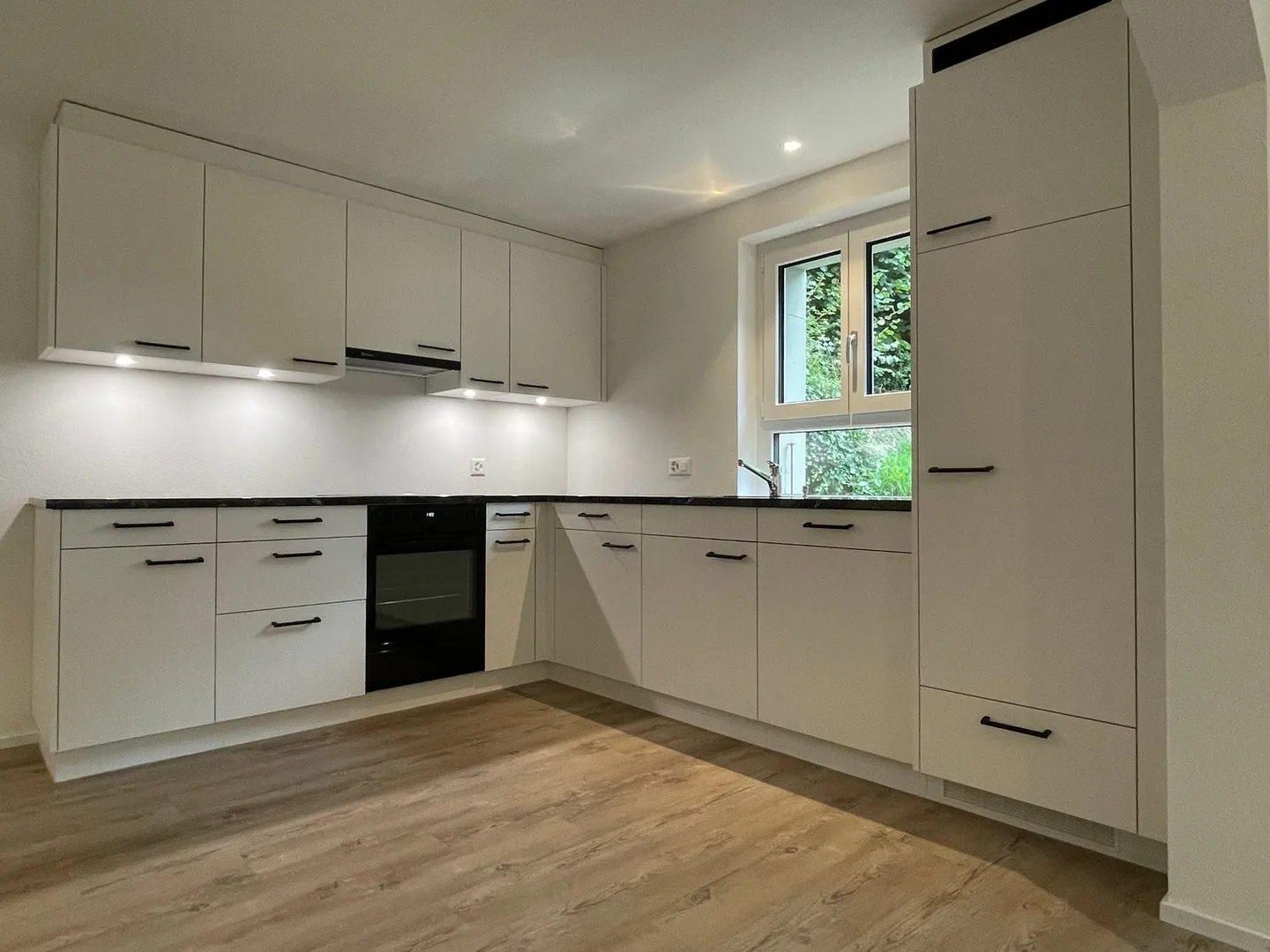Appartement 3.5 pièces au rez-de-chaussée - Photo 1 sur 4