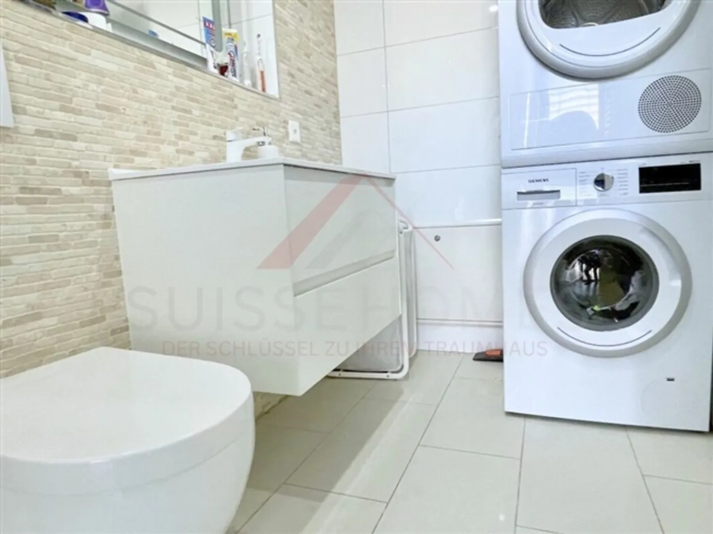 Vivre avec confort - Appartement de 4,5 pièces avec grand balcon et ascenseur, parfait pour les familles et les seniors - Photo 10 sur 14