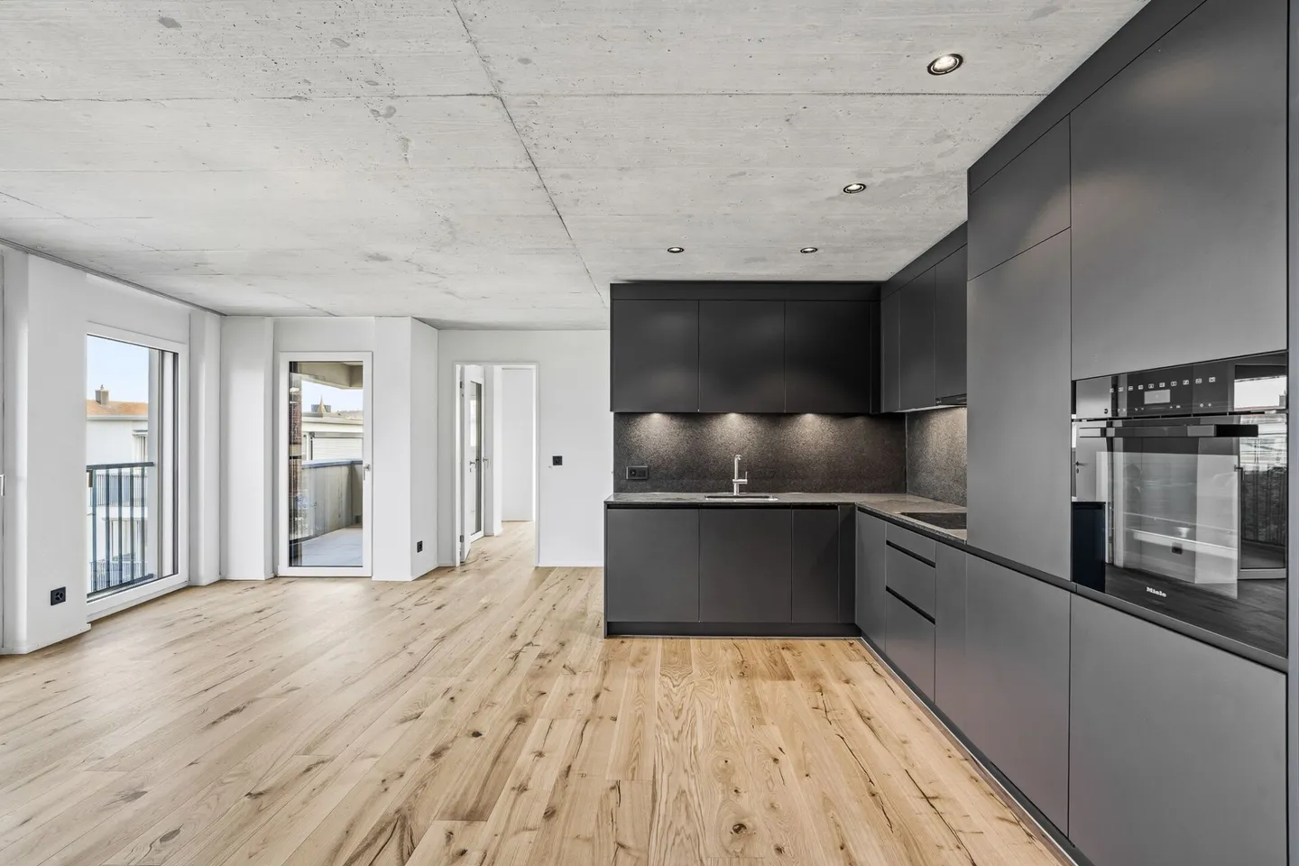 Bezugsbereite 2.5-Zimmer-Neubauwohnung mit hochwertigem Ausbau - Foto 1 von 10