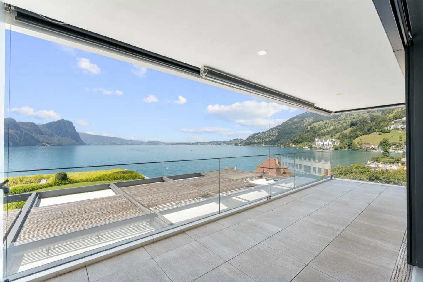Appartamento 3.5 locali con vista unica sul lago - Foto 1 di 11