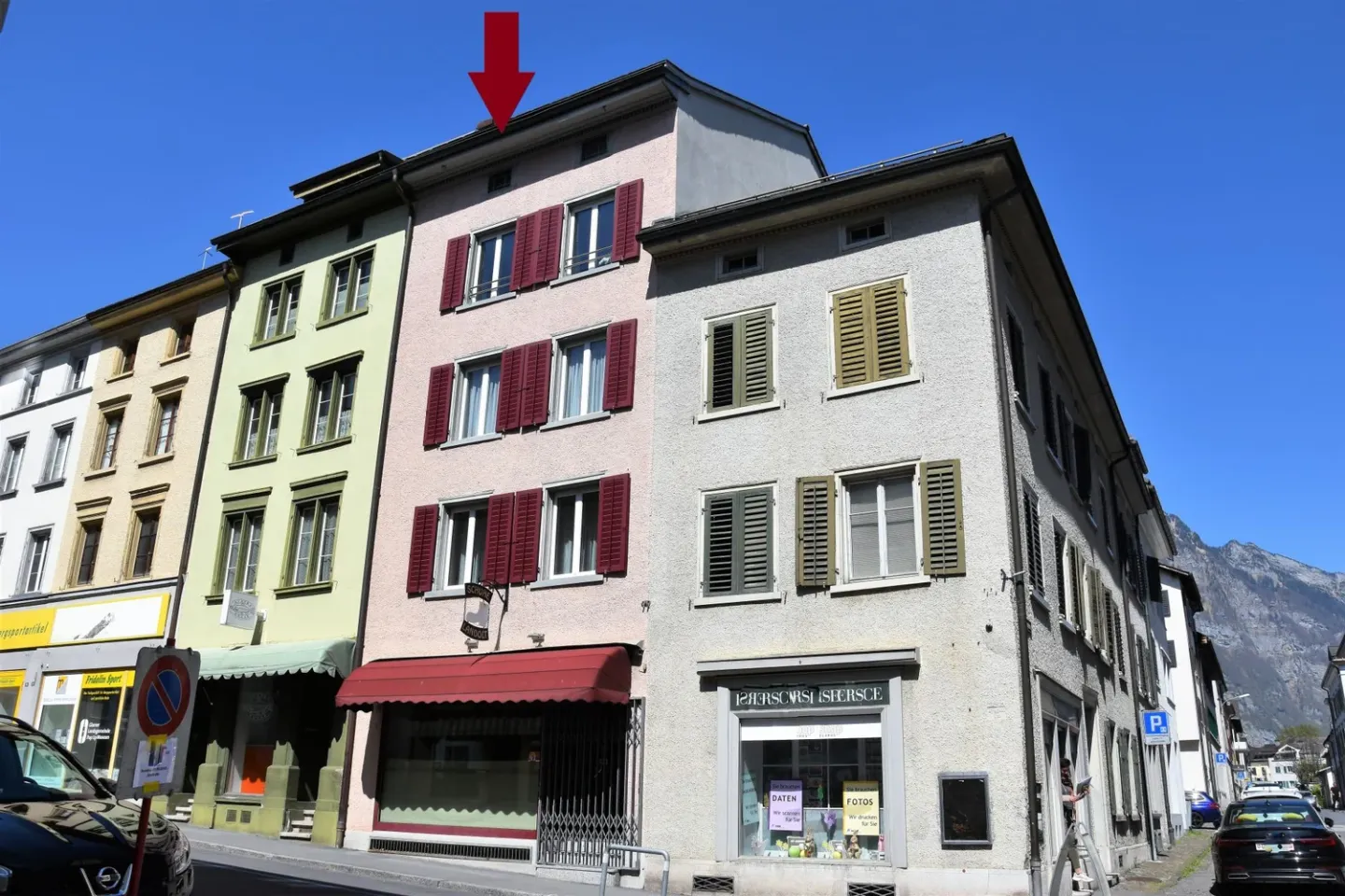 Well-maintained residential building with commercial space. - Photo 1 of 10