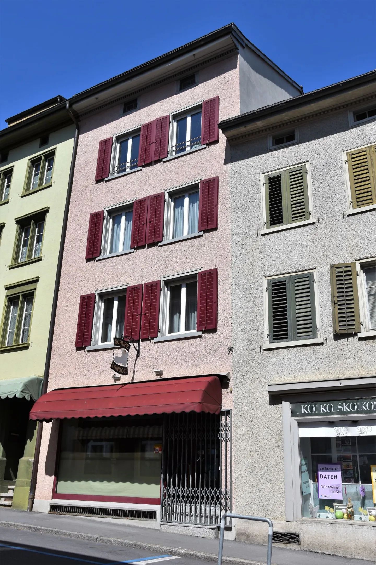 Well-maintained residential building with commercial space. - Photo 2 of 10