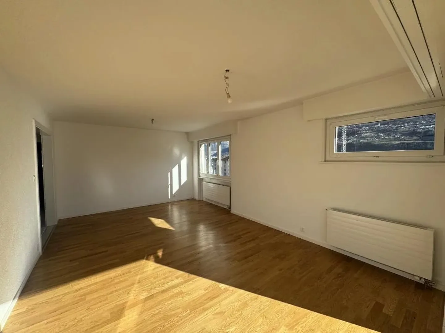 Appartement de 4.5 pièces lumineux - Photo 2 sur 14