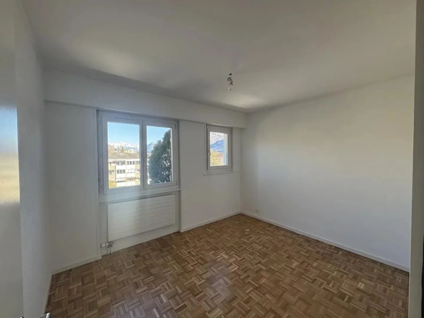 Appartement de 4.5 pièces lumineux - Photo 7 sur 14